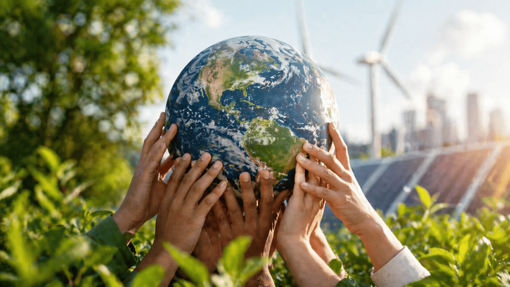 mains diverses portant la Terre